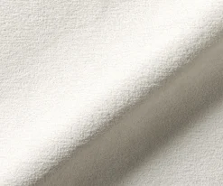 EsszimmerstuhlNube-Flex mit Armlehnen Bouclé Soft Beige Kufengestell Schwarz Taschenfederkern Sofort versandfertig